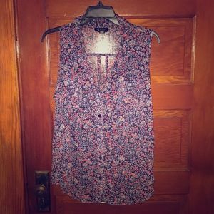 button-down sleeveless blouse